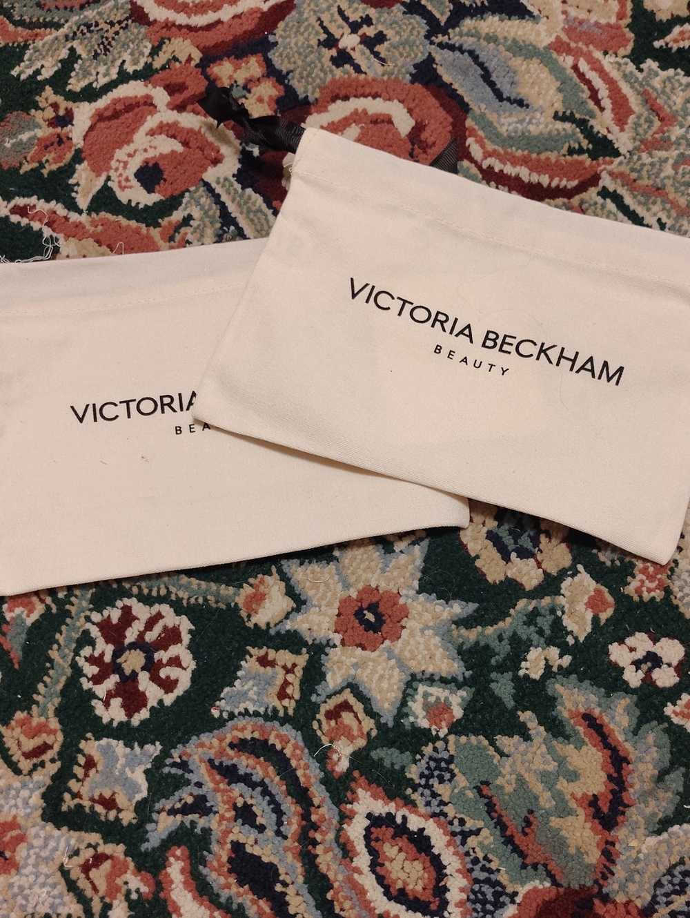 2 Victoria Beckham Cosmetic Bags